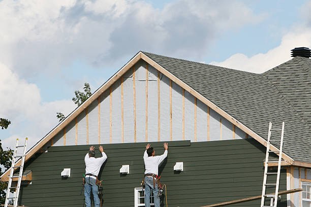 Professional Siding technician working in Northfield, CT